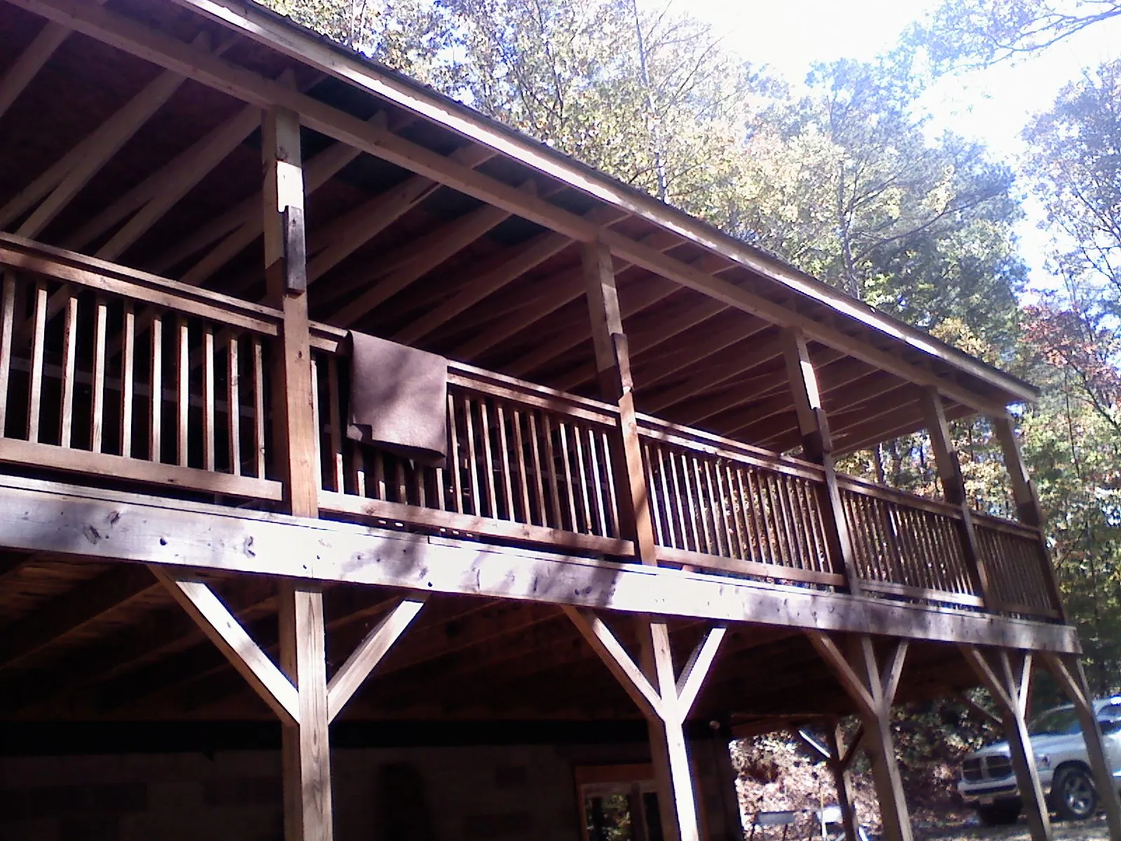 Timber framing under a new elevated porch and deck — Roof Leak Repair in Lecompton by Roofing Brothers